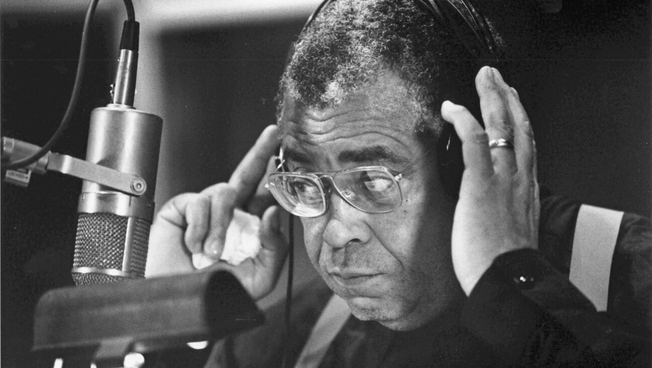 James Earl Jones adjusting his headphones, 1991.