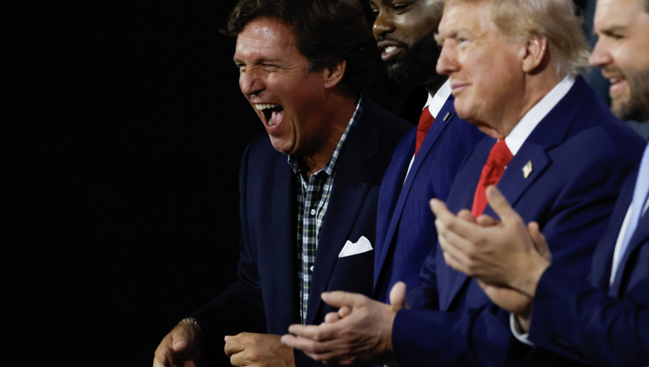 Tucker Carlson, U.S. Rep. Byron Donalds. Donald Trump, and JD Vance at the Republican National Convention.