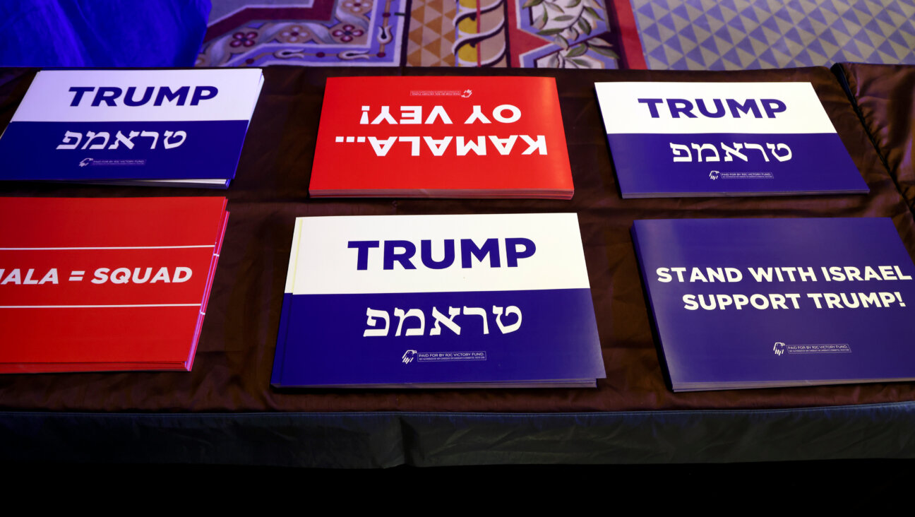 Campaign signs at the Republican Jewish Coalition's  annual conference in Las Vegas, Nevada on Sept. 5, 2024. 