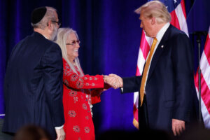 Former President Donald Trump with Miriam Adelson and Rabbi Yehuda Kaploun Sept. 19.