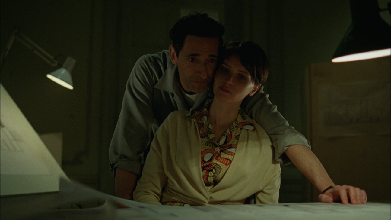 Adrien Brody and Felicity Jones in <i>The Brutalist.</i>
