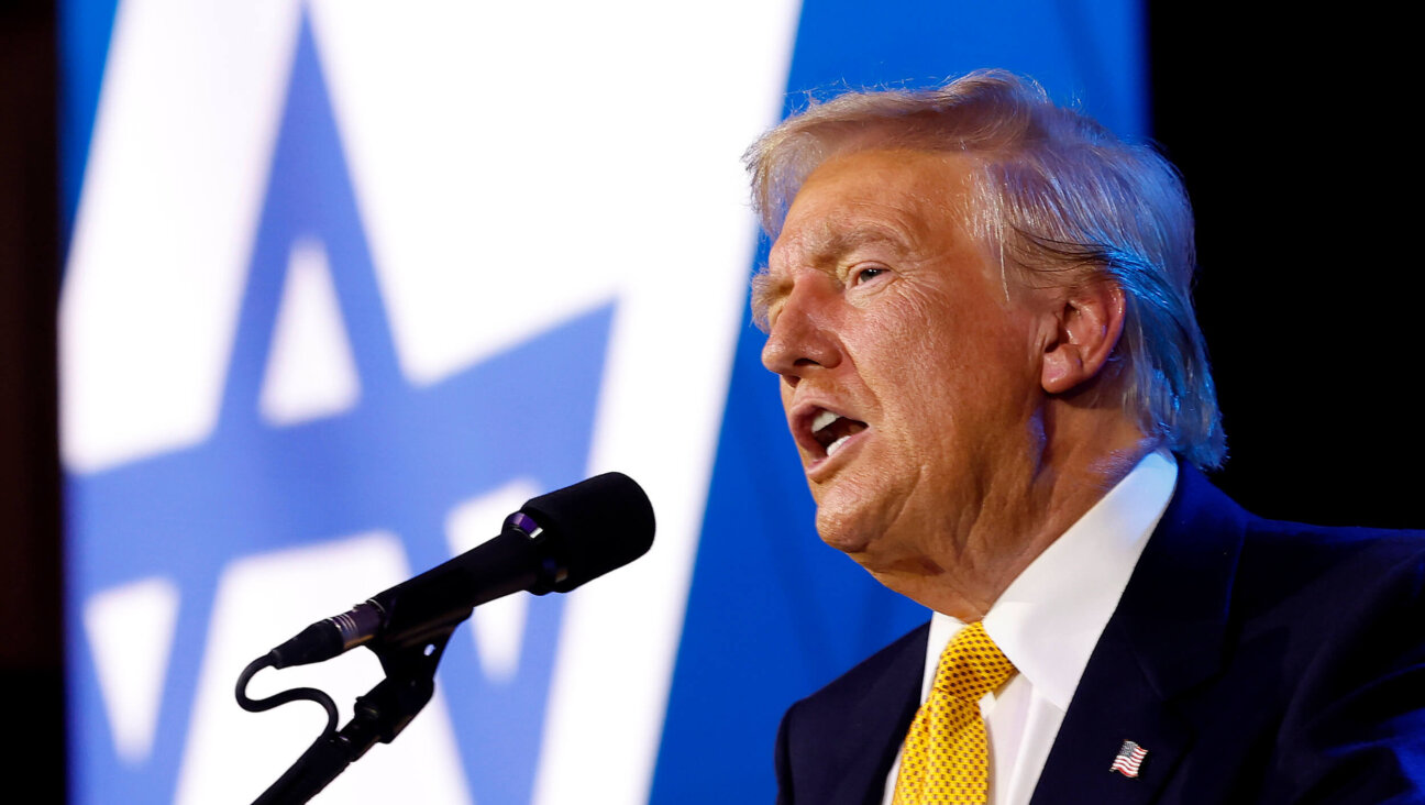 Former President Donald Trump delivers remarks at the Israeli American Council National Summit on Sept. 19. 