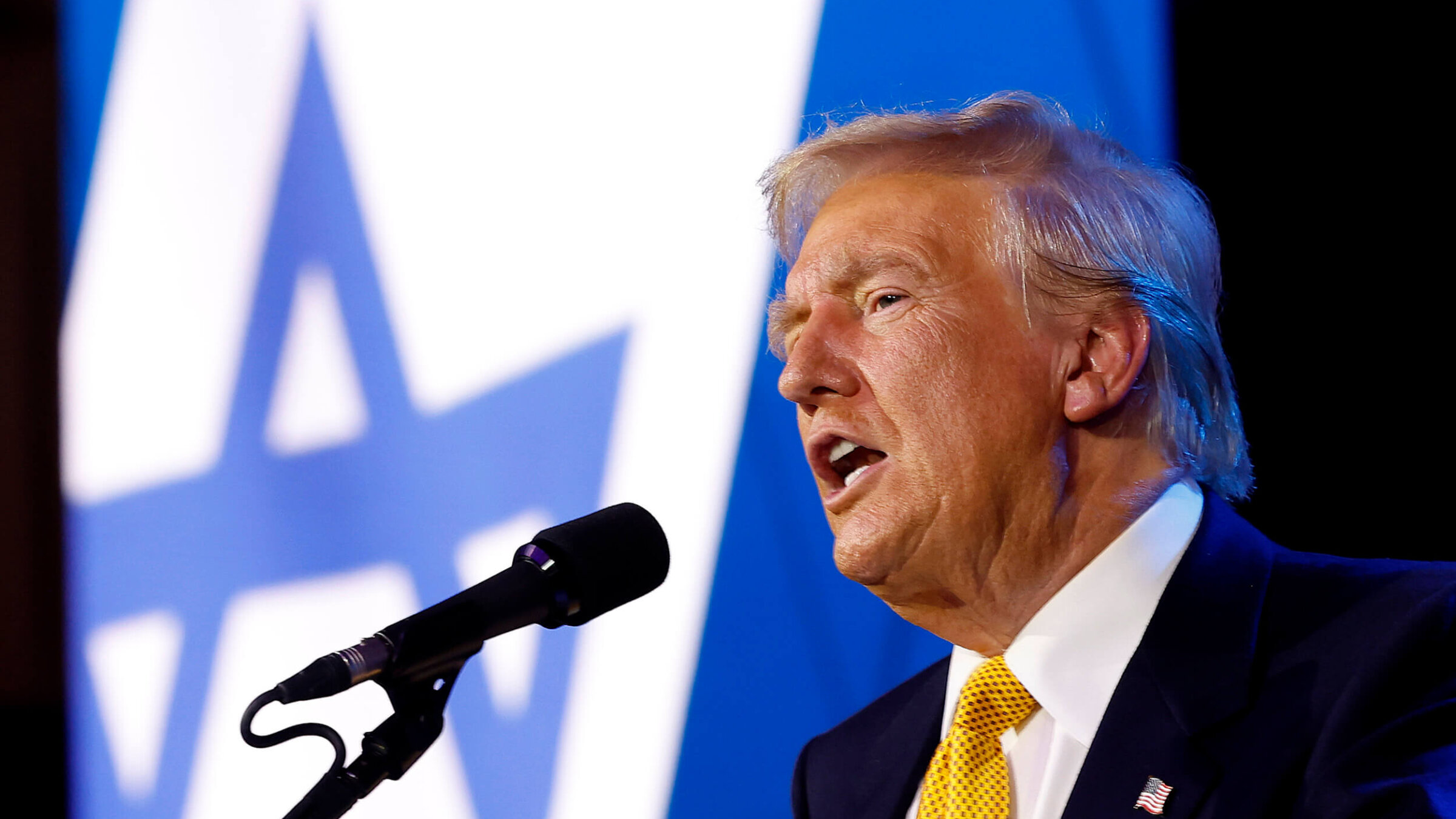 Former President Donald Trump delivers remarks at the Israeli American Council National Summit on Sept. 19. 