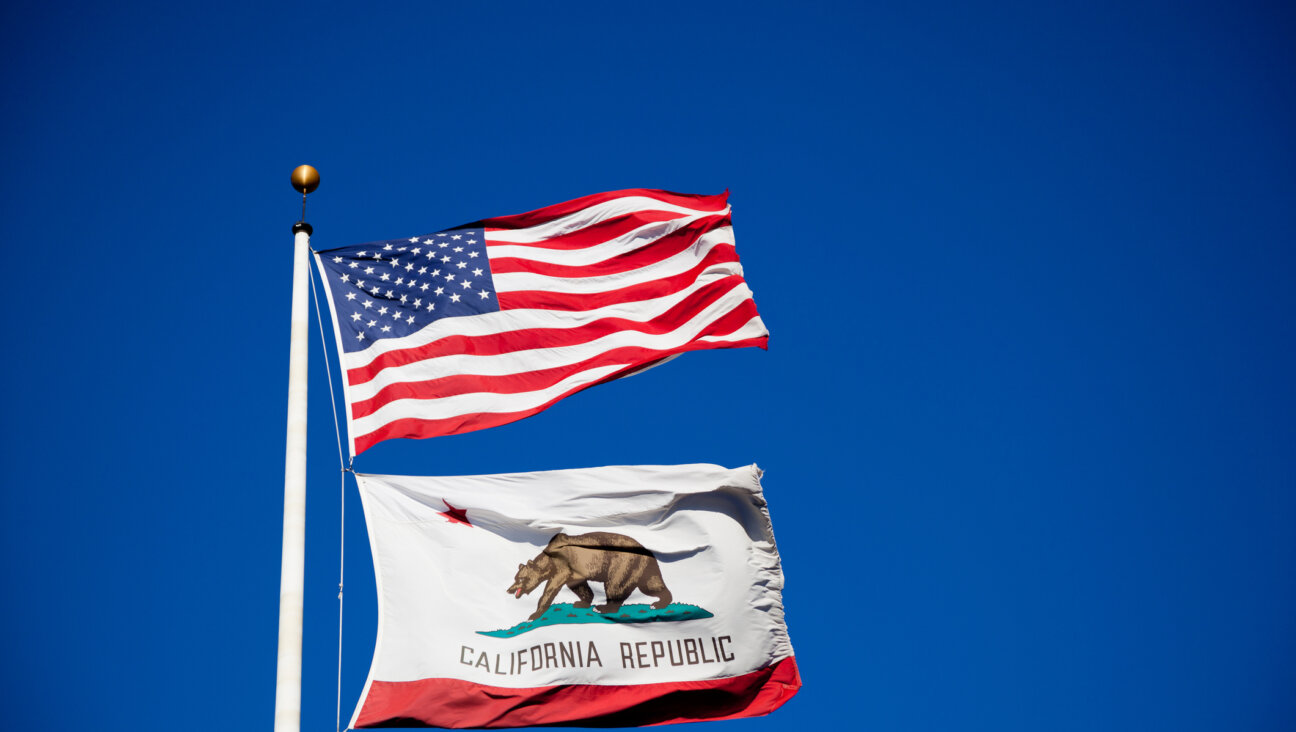 The flags of the USA and California