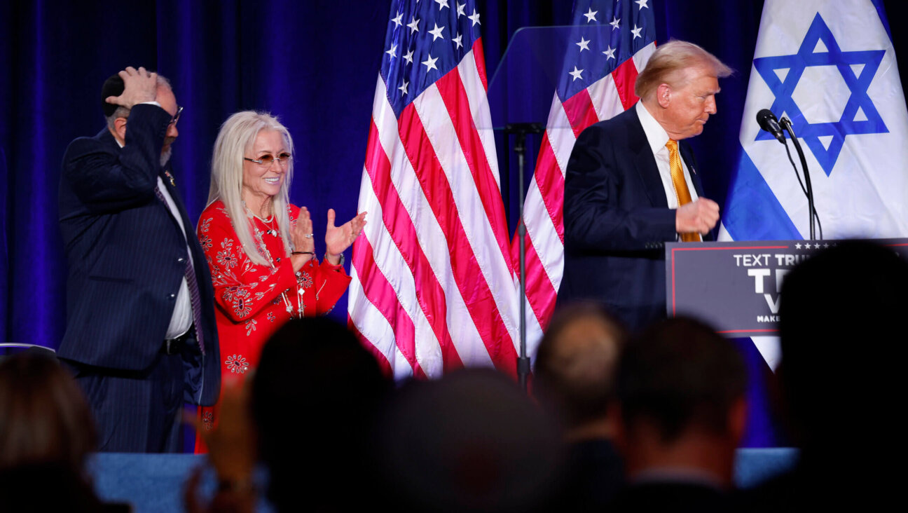 Miriam Adelson, widow of billionaire casino magnate Sheldon Adelson, applauds as former President Donald Trump leaves the stage at an event titled "Fighting Anti-Semitism in America" on Sept. 19. 