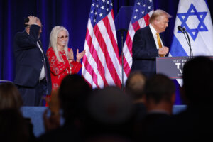 Miriam Adelson, widow of billionaire casino magnate Sheldon Adelson, applauds as former President Donald Trump leaves the stage at an event titled "Fighting Anti-Semitism in America" on Sept. 19. 