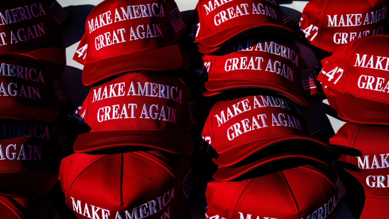 "Make American Great Again" hats for sale before a town hall event with former President Donald Trump and Arkansas governor Sarah Huckabee Sanders. 