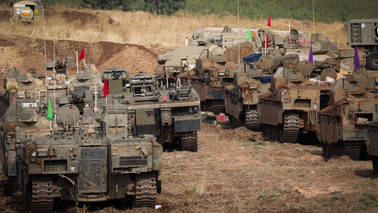 Israeli soldiers seen at a staging area near the Israeli border with Lebanon, Oct. 1, 2024. (David Cohen/Flash90)