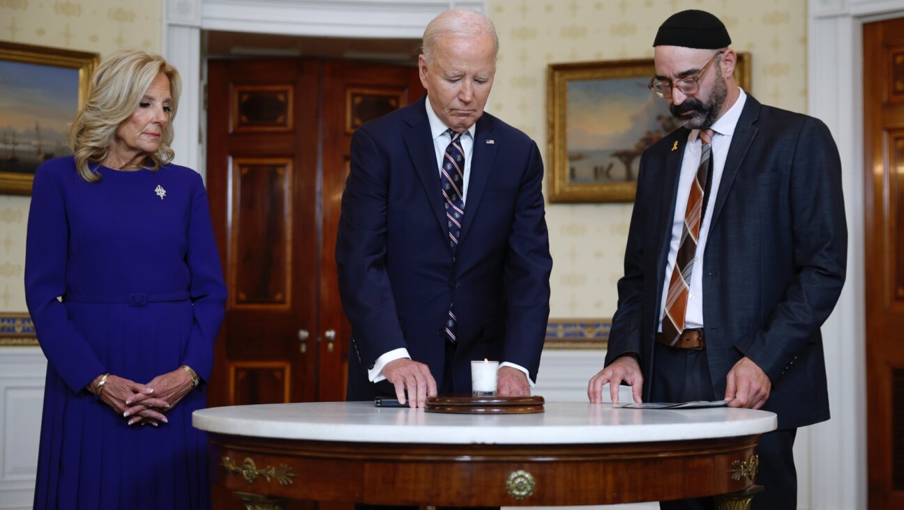 U.S. President Joe Biden participates in a moment of silence at a remembrance ceremony on the one-year anniversary of the Hamas attack on Israel in the Blue Room at the White House, Oct. 7, 2024. (Kevin Dietsch/Getty Images)