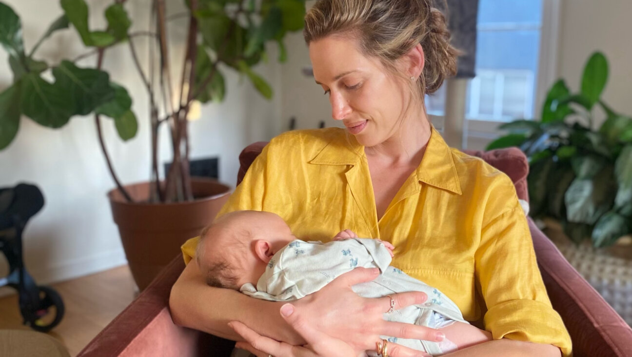 Danielle Berrin with her newborn son, Moses Tzvi, named after the late Hersh Goldberg-Polin.