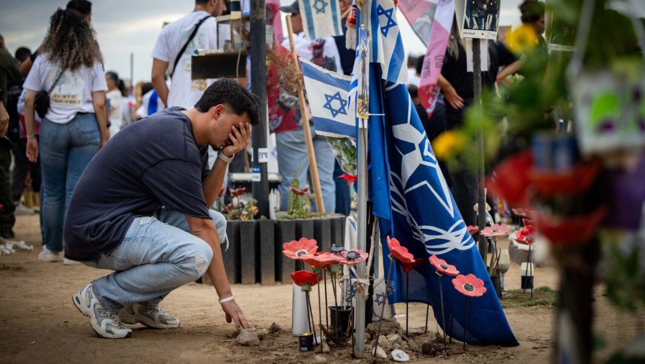 Friends and family of the victims of the Nova music festival massacre gather at the site of the massacre in southern Israel one year after the attack, Oct. 7, 2024. (Yonatan Sindel/Flash90)