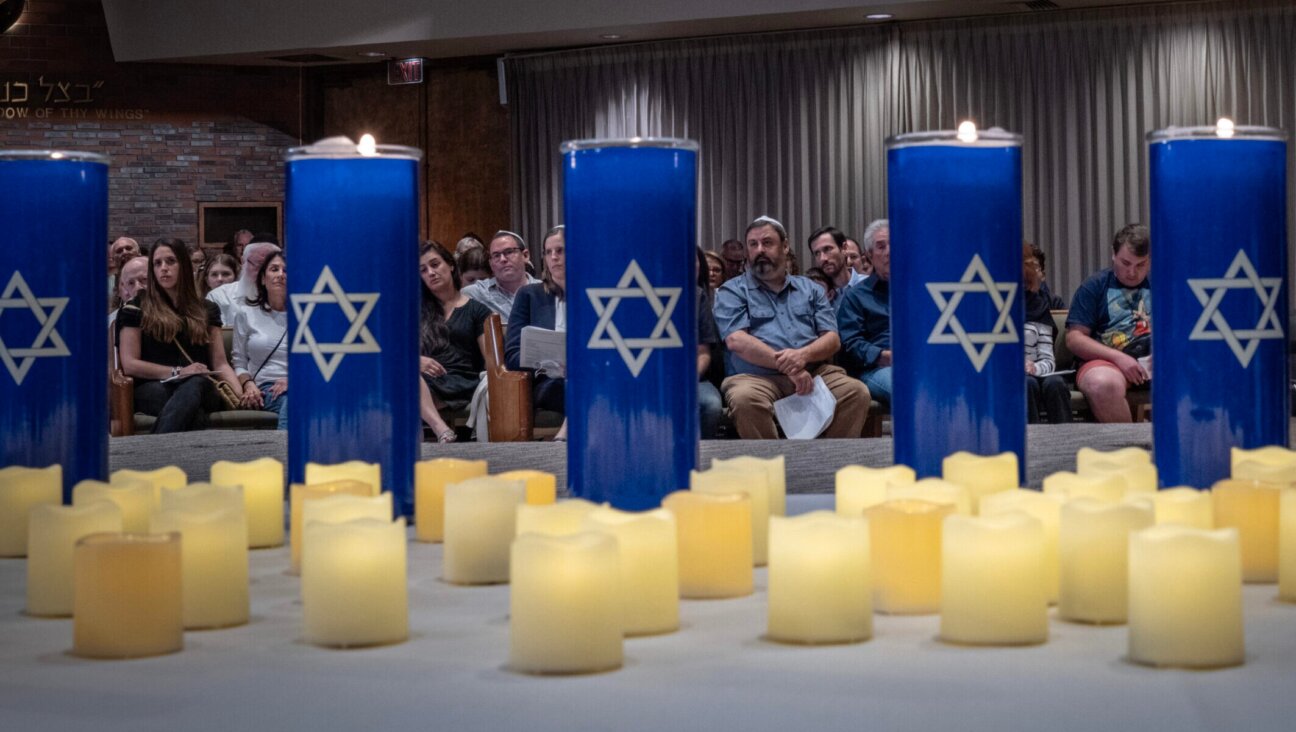 Jews attend a vigil at the Stephen Wise Temple in Los Angeles, Oct. 8, 2023. (Barbara Davidson/Getty Images)