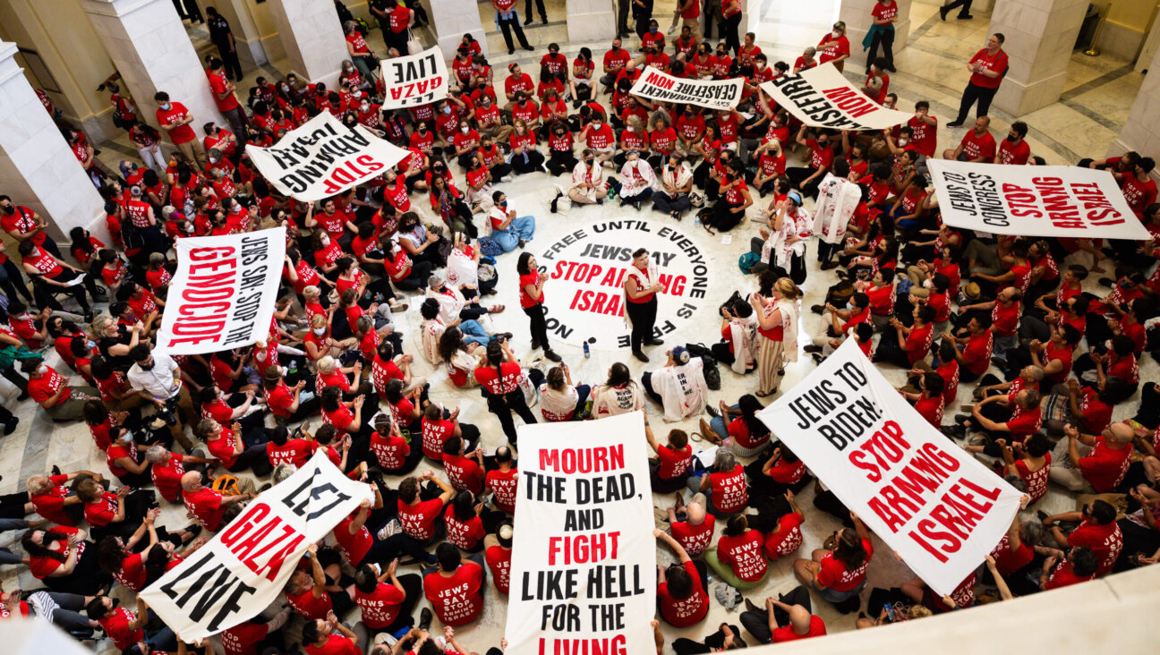 WASHINGTON, DC - JULY 23: Demonstrators from Jewish Voice For Peace protest the war in Gaza at the Canon House Building on July 23, 2024 in Washington, DC a day before Prime Minister Netanyahu addresses Congress.