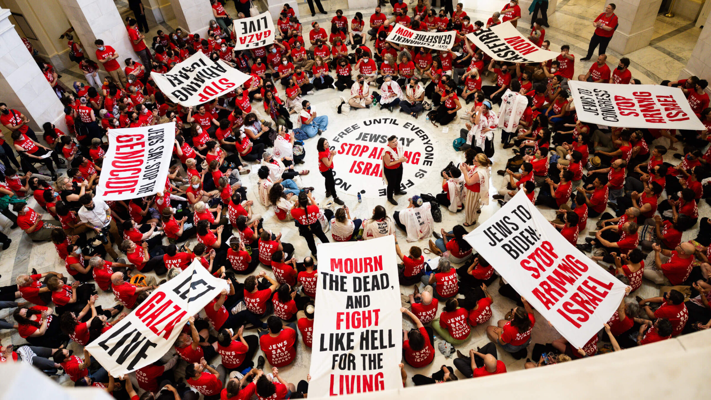 WASHINGTON, DC - JULY 23: Demonstrators from Jewish Voice For Peace protest the war in Gaza at the Canon House Building on July 23, 2024 in Washington, DC a day before Prime Minister Netanyahu addresses Congress.