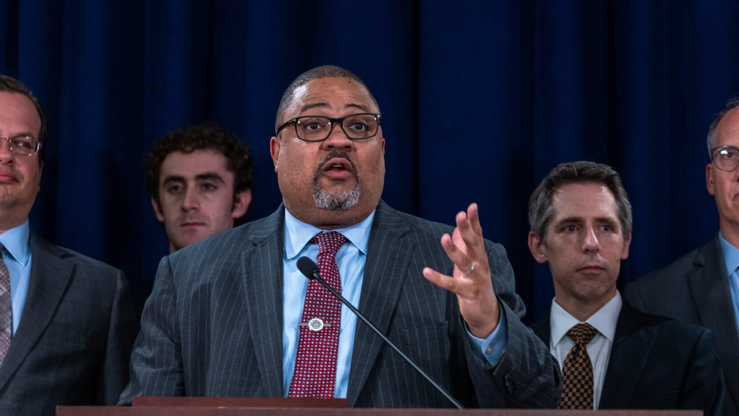 NEW YORK, NEW YORK - MAY 30: Manhattan District Attorney Alvin Bragg stands with members of his staff at a news conference following the conviction of former U.S. President Donald Trump in his hush money trial on May 30, 2024 in New York City. Trump was found guilty on all 34 felony counts of falsifying business records in the first of his criminal cases to go to trial. 