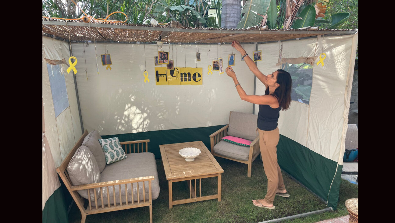 Yael Aisenthal-Kordevani decorated her sukkah in the city of Modi’in with symbols of the year since Hamas’ Oct. 7 attack on Israel, Oct. 15, 2024. (Courtesy Aisenthal-Kordevani)