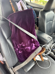 A Torah scroll from Temple Beth-El in St. Petersburg, Florida, was safely buckled in before fleeing Hurricane Milton.