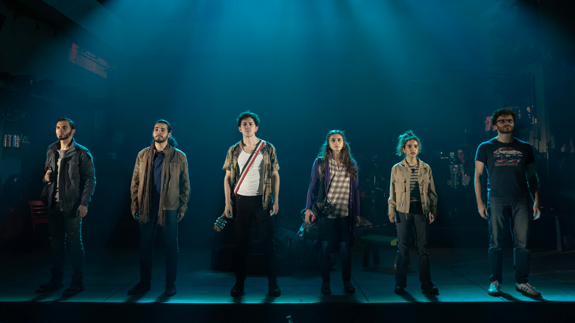 From left to right: Drew Elhamalawy, John El-Jor, Ali Louis Bourzgui, Nadina Hassan, Rotana Tarabzouni and Michael Khalid Karadsheh in <i>We Live in Cairo</i> at 
the New York Theatre Workshop