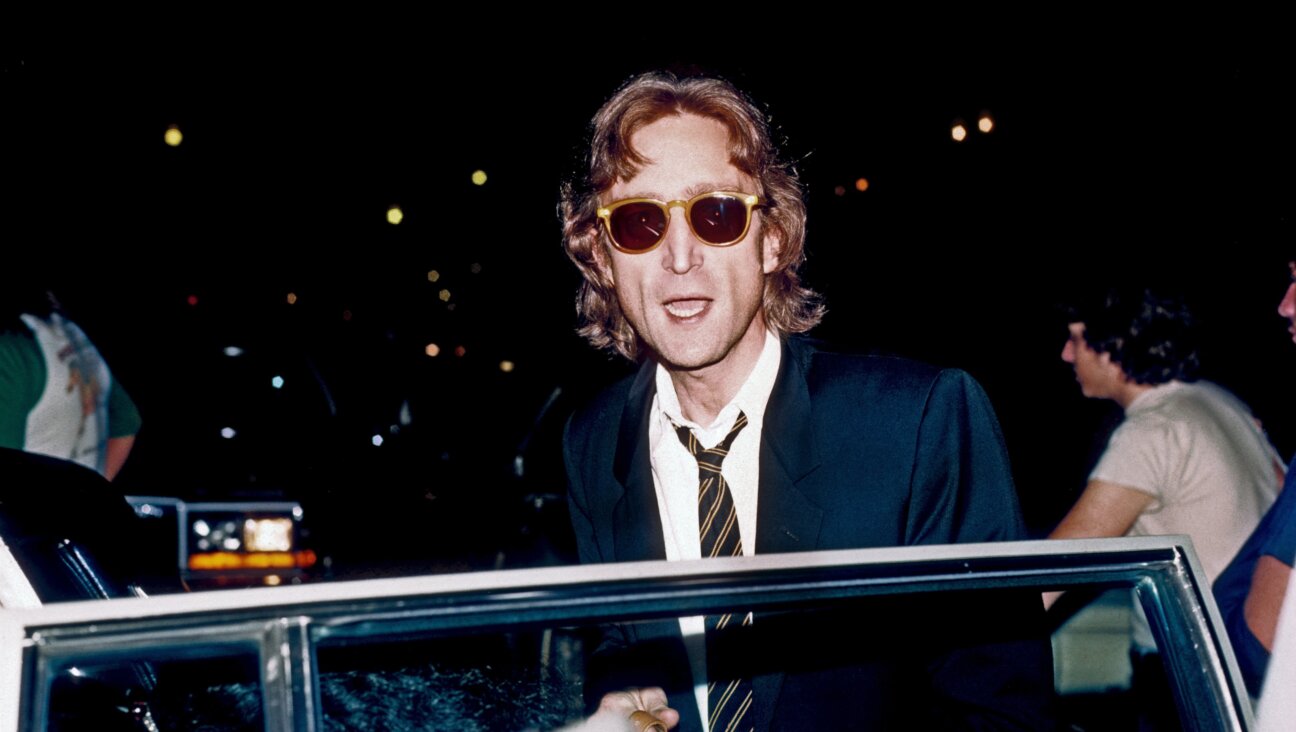 John Lennon arrives at the the 'Hit Factory' recording studio in 1980.