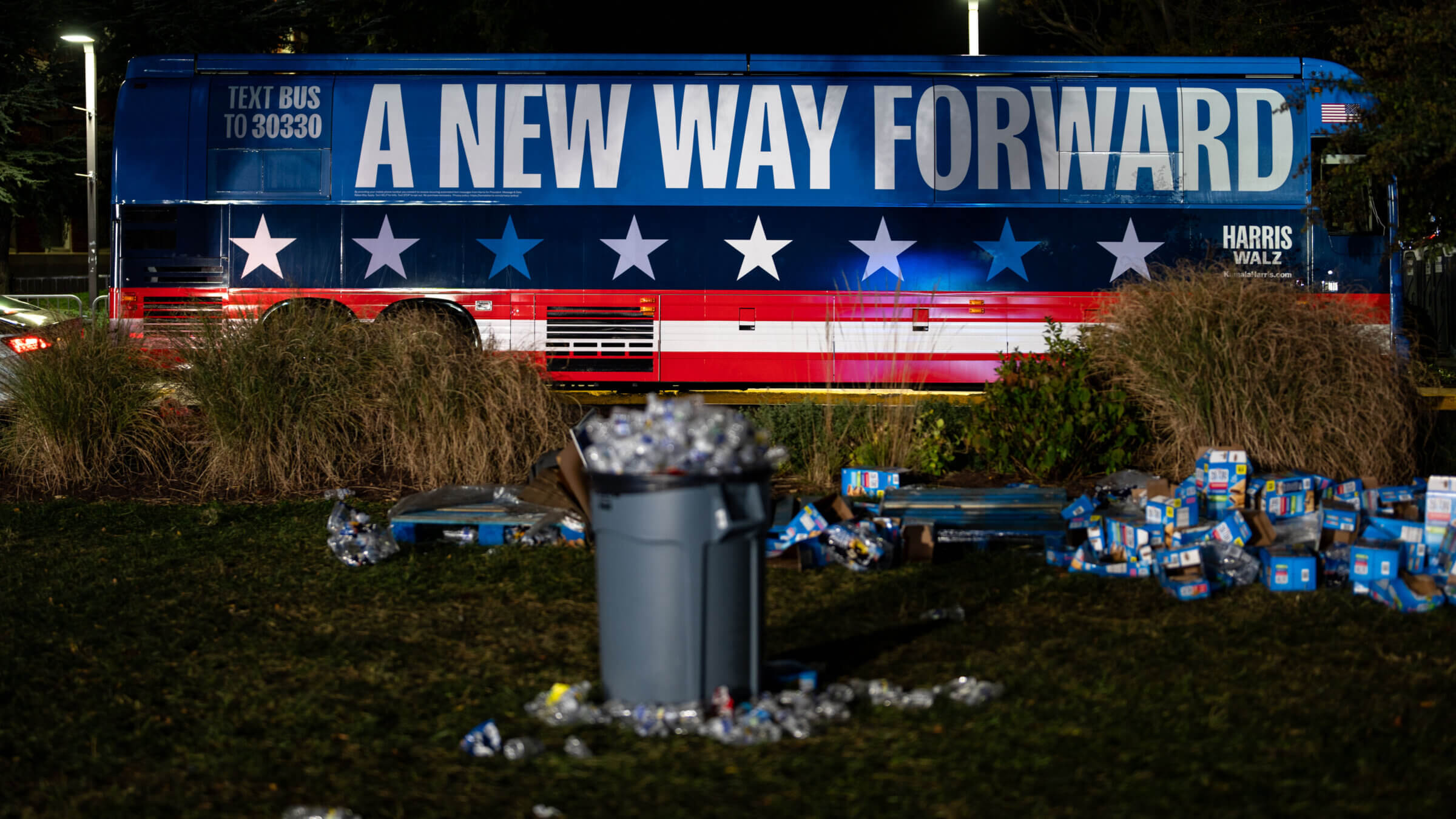 Chairs and trash sit in an empty field after the Harris election night watch party at Howard University Tuesday.