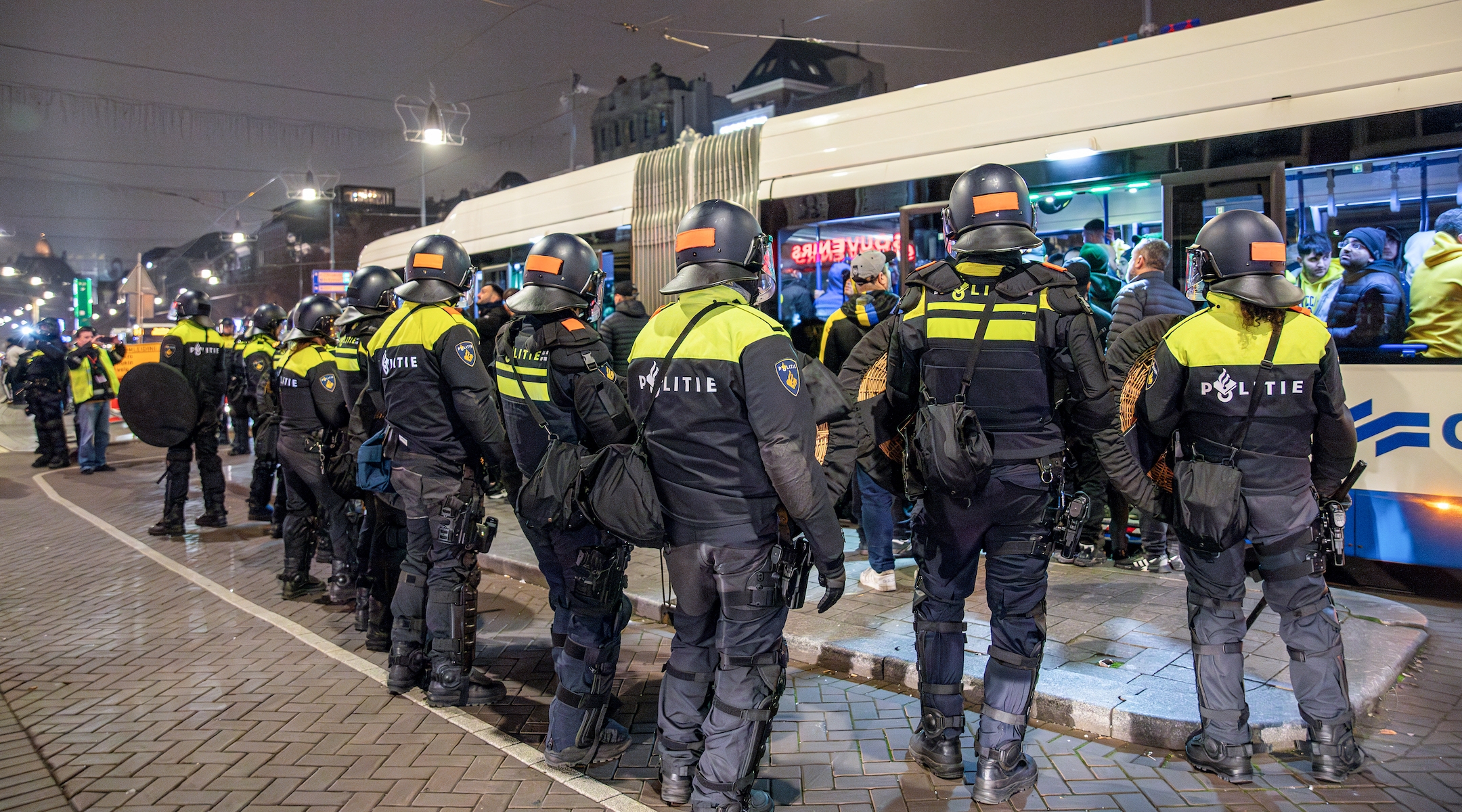 Dutch Police stand guard after attacks on Israeli fans following the soccer game between Ajax and Maccabi Tel Aviv in Amsterdam on Nov. 8, 2024. (VLN Niews / ANP / AFP)