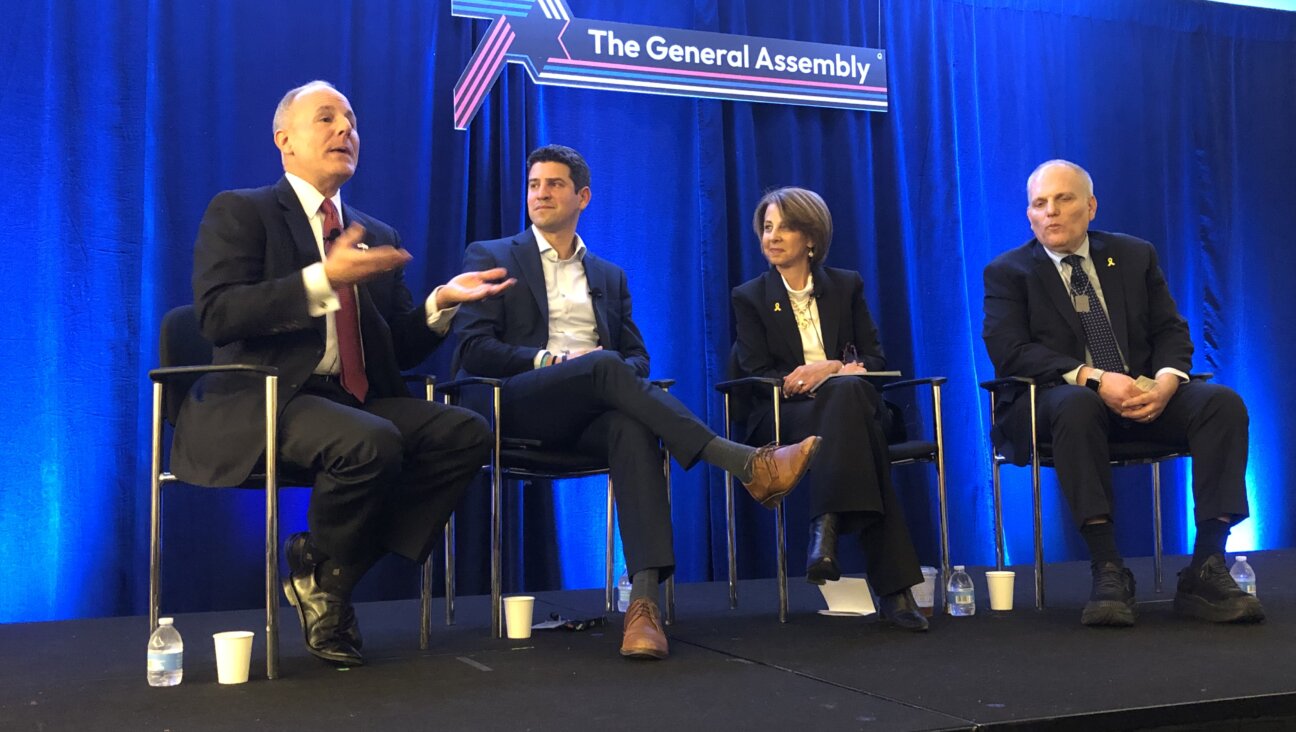 Left to right, Elan Carr, Chanan Weissmann, moderator Liz Shrayer  and William Daroff discuss Jewish relations with presidential administrations on Nov. 11, 2024, at a panel organized by the Jeish Federations of North American at their annual conference in Washington, D.C.