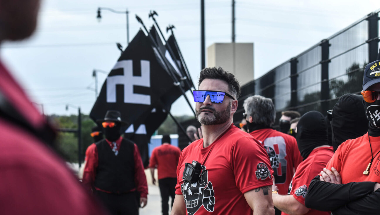 Joe Minadeo, leader of the antisemitic hate group Goyim Defense League, rallies with another neo-Nazi group, Blood Tribe on Sept. 2, 2023 in Orlando, Florida.  