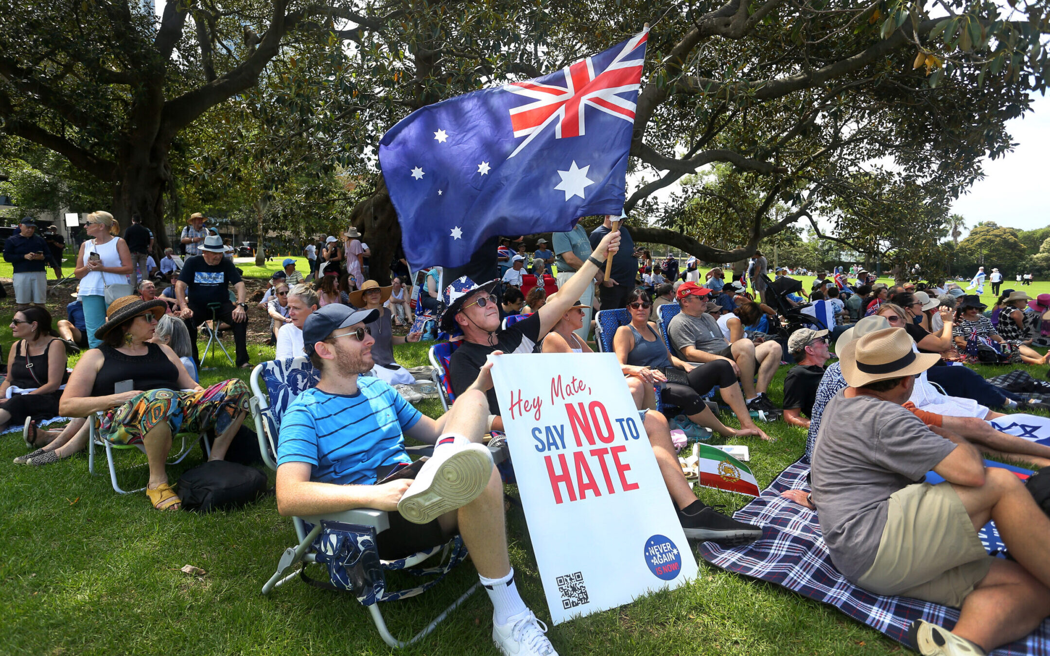 Protesters hold placards and flags during a rally against antisemitism at The Domain in Sydney, Australia, on Feb. 18, 2024. (Lisa Maree Williams/Getty Images)