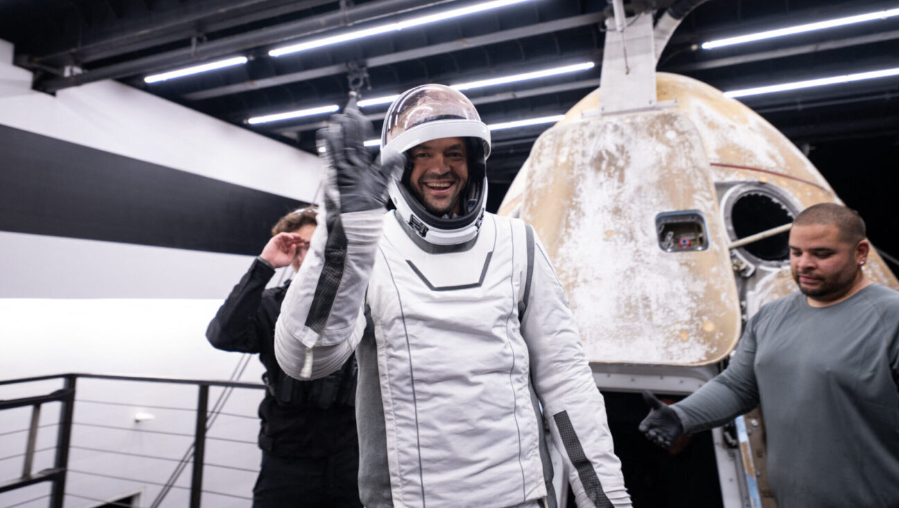 This handout photo provided by SpaceX and Polaris on Sept. 15, 2024, shows Jared Isaacman, mission commander, stepping out of the manned Polaris Dawn mission’s “Dragon” capsule after it splashed down off the coast of Dry Tortugas, Florida, after completing the first human spaceflight mission by non-government astronauts of the Polaris Program. (Polaris Program/AFP via Getty Images)