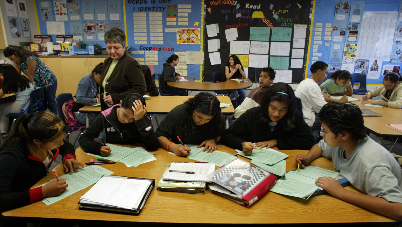 Armine Der-Karabetian, director English language program at Language Aquisition Program in Fontana, California, walks among students at the school which focuses on educating non-English-speaking immigrant children who just entered the United States.