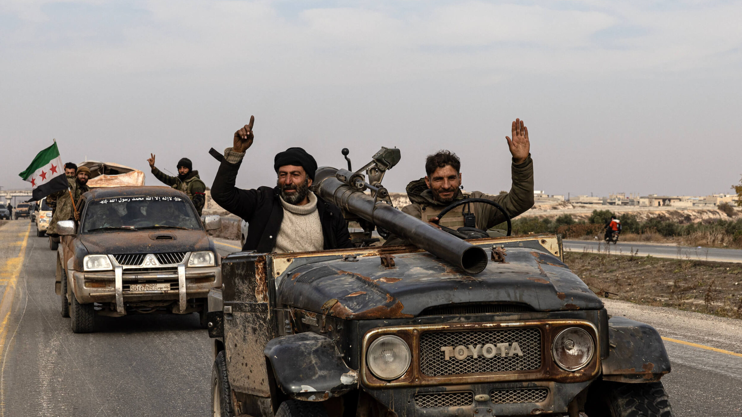 Syrian rebels celebrate their victories in a lightning-quick toppling of Bashar al-Assad's regime.