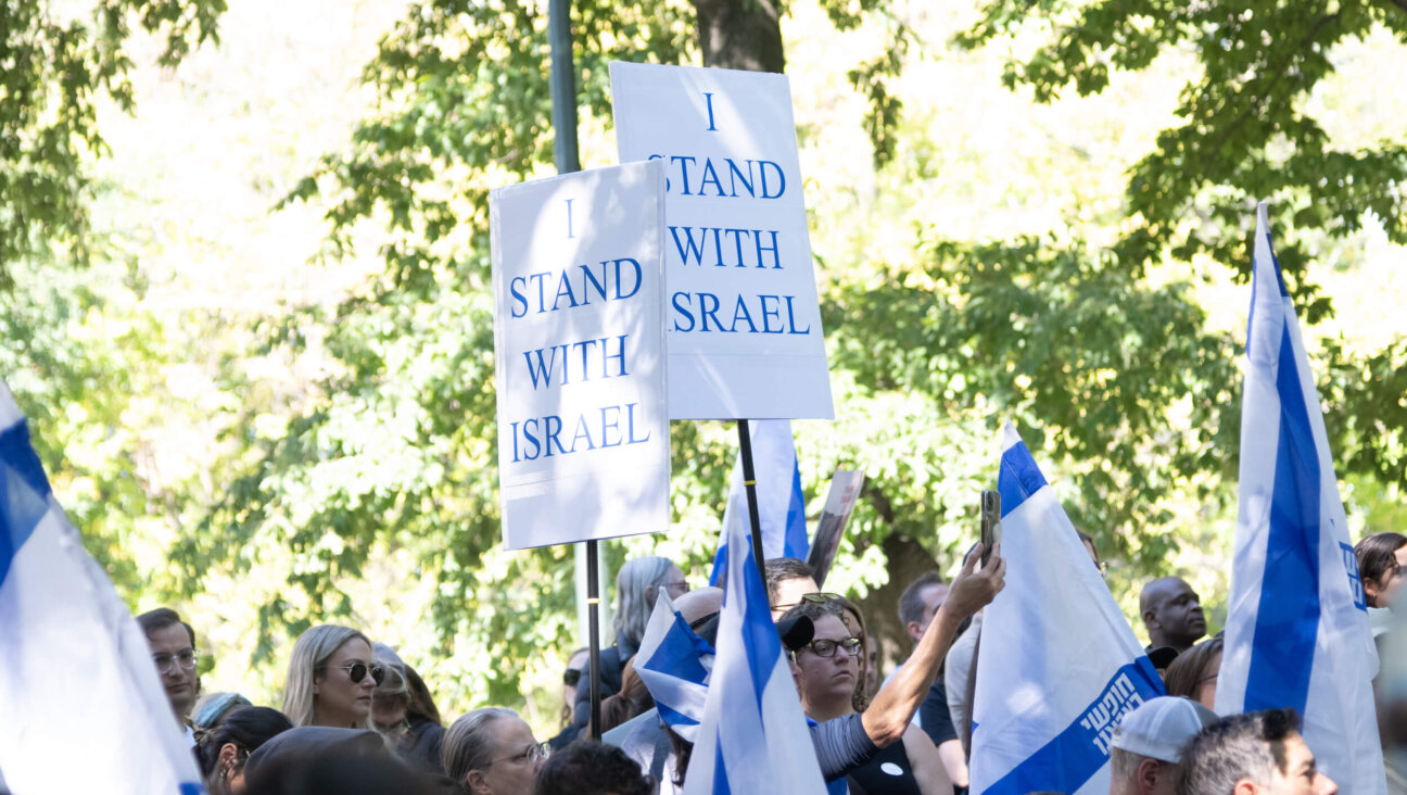 People hold signs that read, "I stand with Israel" during a New York City rally to mark the first anniversary of the Oct. 7 terror attacks on Israel. 