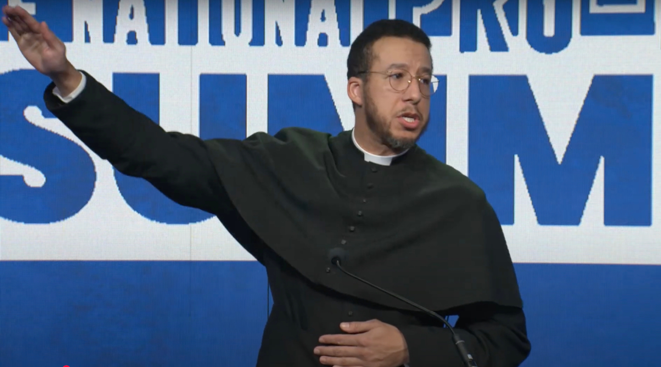 Father Calvin Robinson delivers Elon Musk’s salute at the National Pro-Life Summit, Jan. 25, 2025, in Washington, DC. (Screenshot via YouTube)