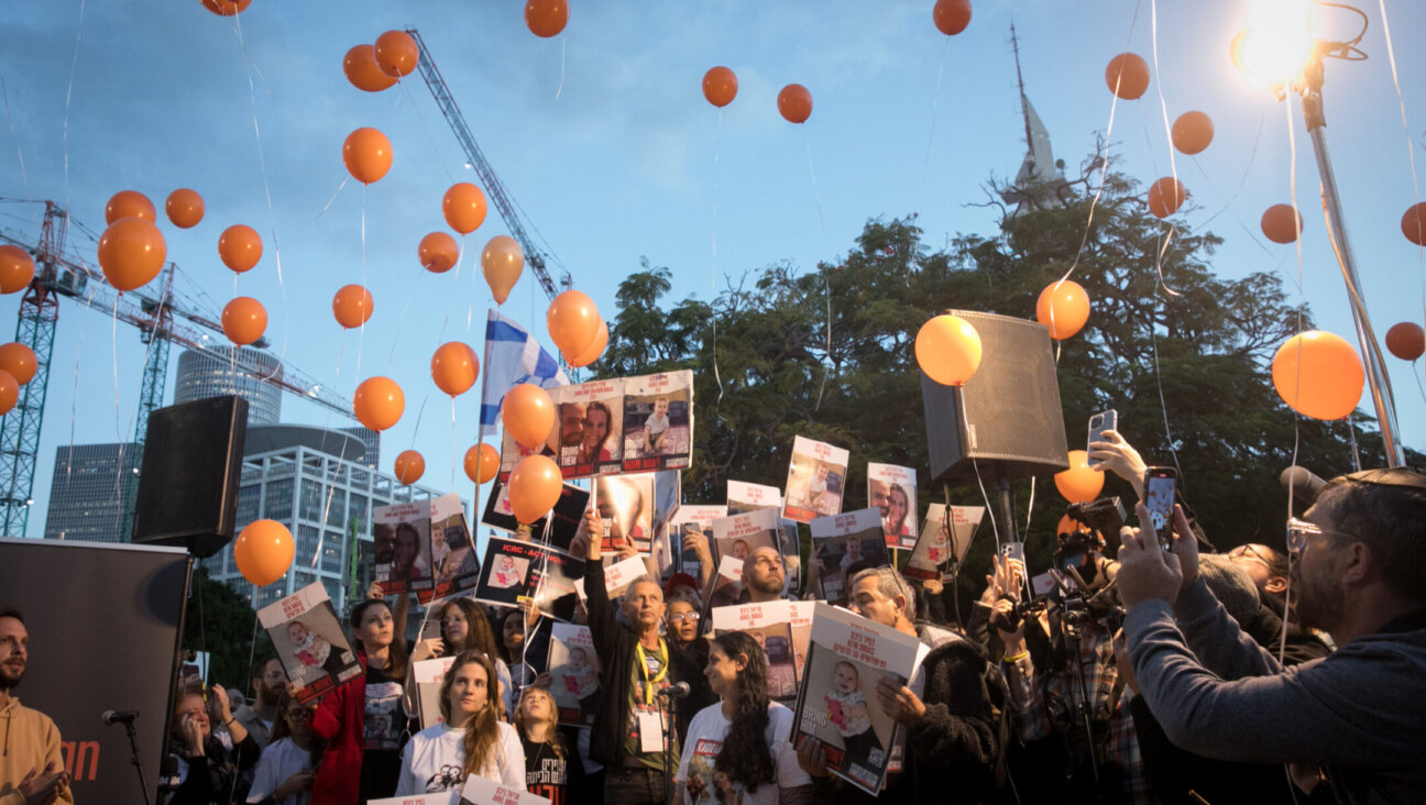 Orange balloons have become a symbol of the Bibas family because of the abducted children’s red hair. (Miriam Alster/Flash90)