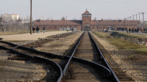 The train tracks at Birkenau, where trains from countries across Europe delivered Jews to Auschwitz and the Nazis during the Holocaust. (Dave Thompson – PA Images/PA Images via Getty Images)