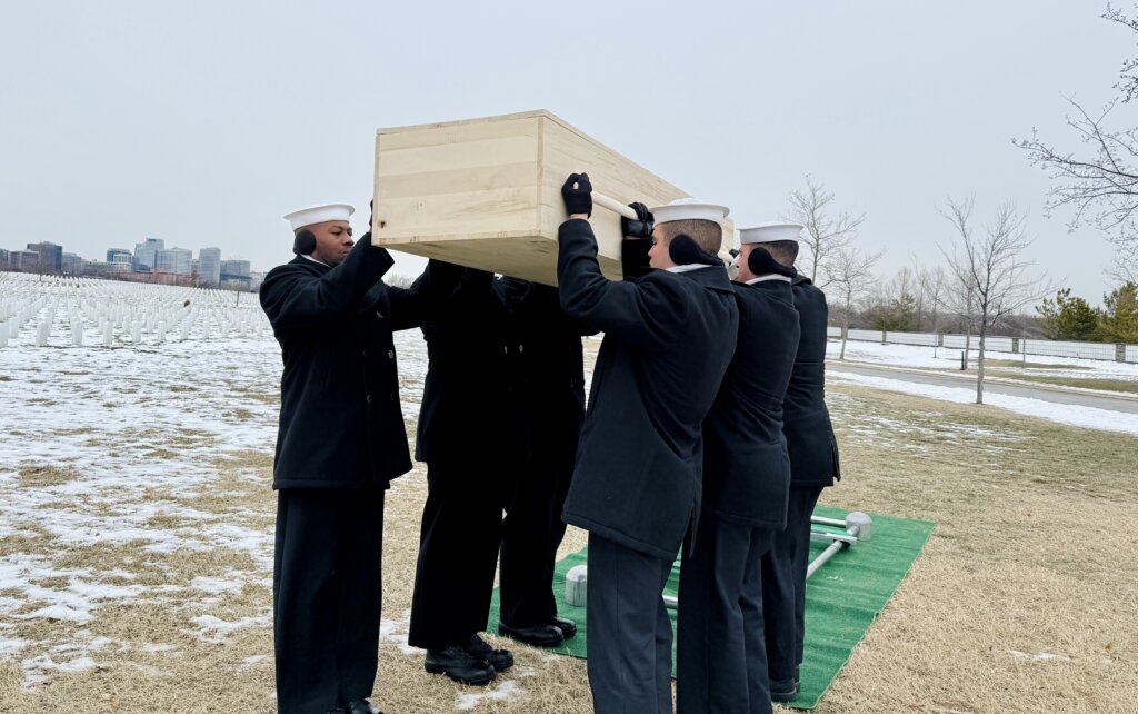 A Navy honor guard served as pallbearers at the funeral of Elsie Adler at Arlington National Cemetery.