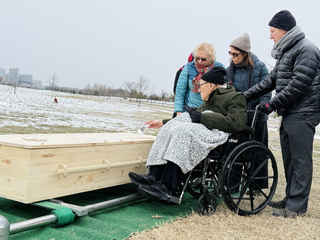 Norm Kaufman, in wheelchair, flanked by his children, from left: Ruth, Judy and David.