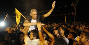 Freed Palestinian prisoner Ateya Abu Moussa, who was held by Israel for 20 years, is greeted by his relatives and friends upon arrival at his family’s house in Khan Younis in the southern Gaza Strip, Aug. 14, 2013. (Abed Rahim Khatib / Flash 90)