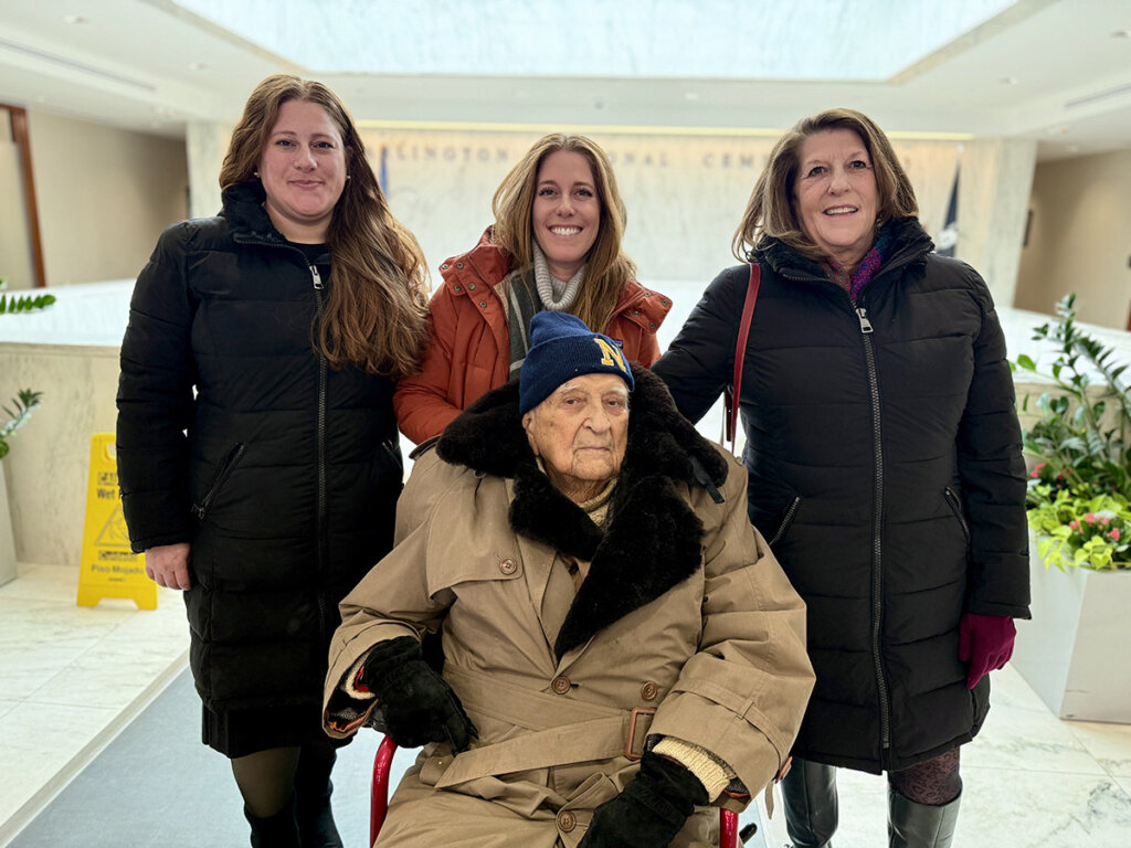 Bob Adler surrounded by (left to right): granddaughters Talya and Sheera, and daughter Tracey.