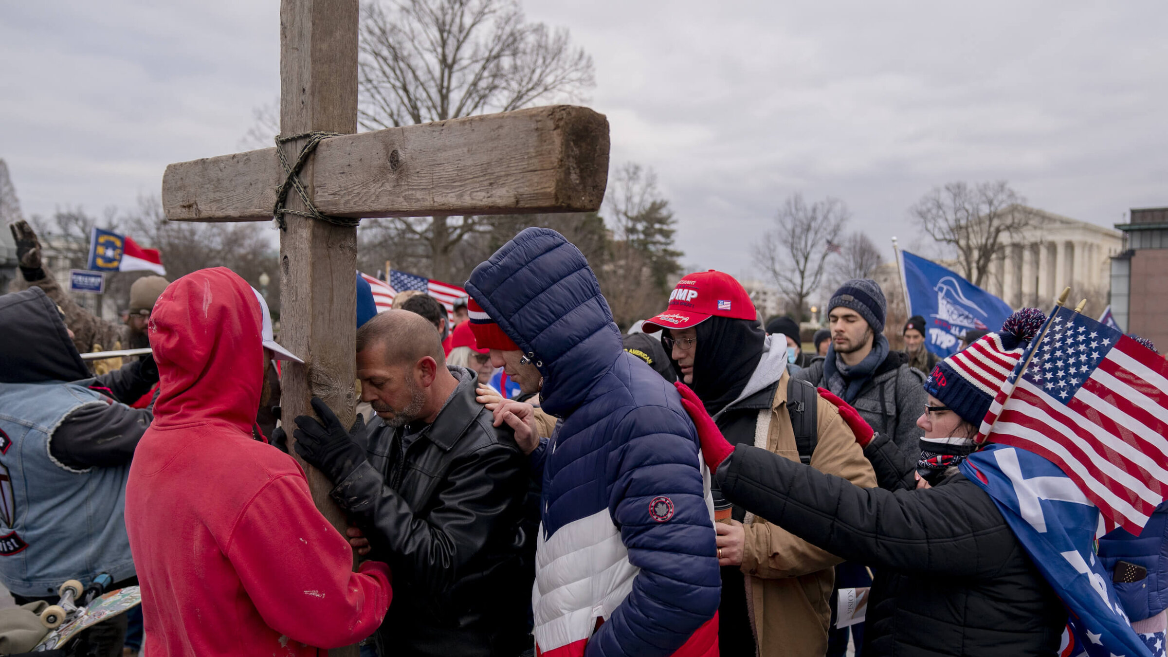 Demonstrators erect a wooden cross outside the U.S. Capitol in Washington, D.C., on Wednesday, Jan. 6, 2021. 