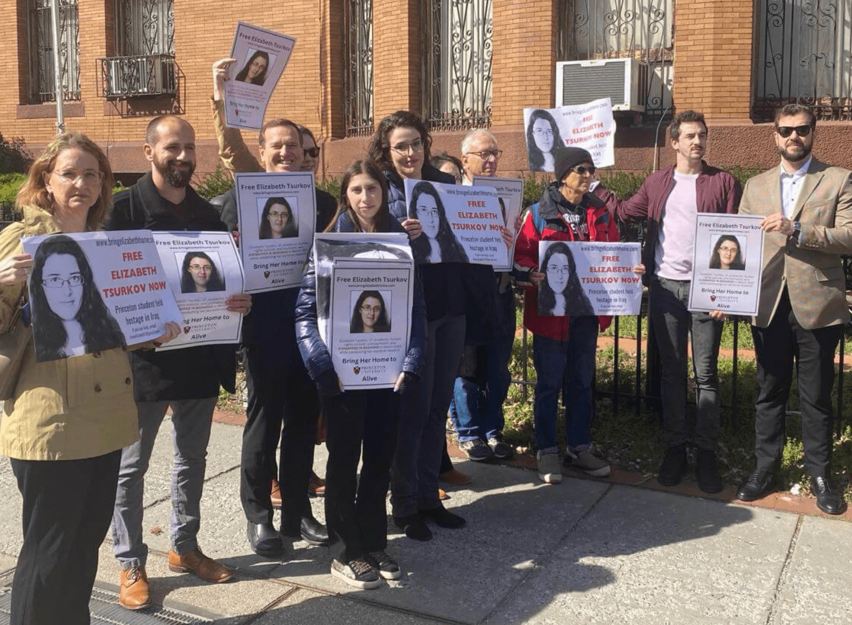 Emma Tsurkov, at center with glasses, led a protest outside the Iraqi embassy on March 21, 2024, exactly a year after her sister, Elizabeth, was kidnapped from a Baghdad cafe. 