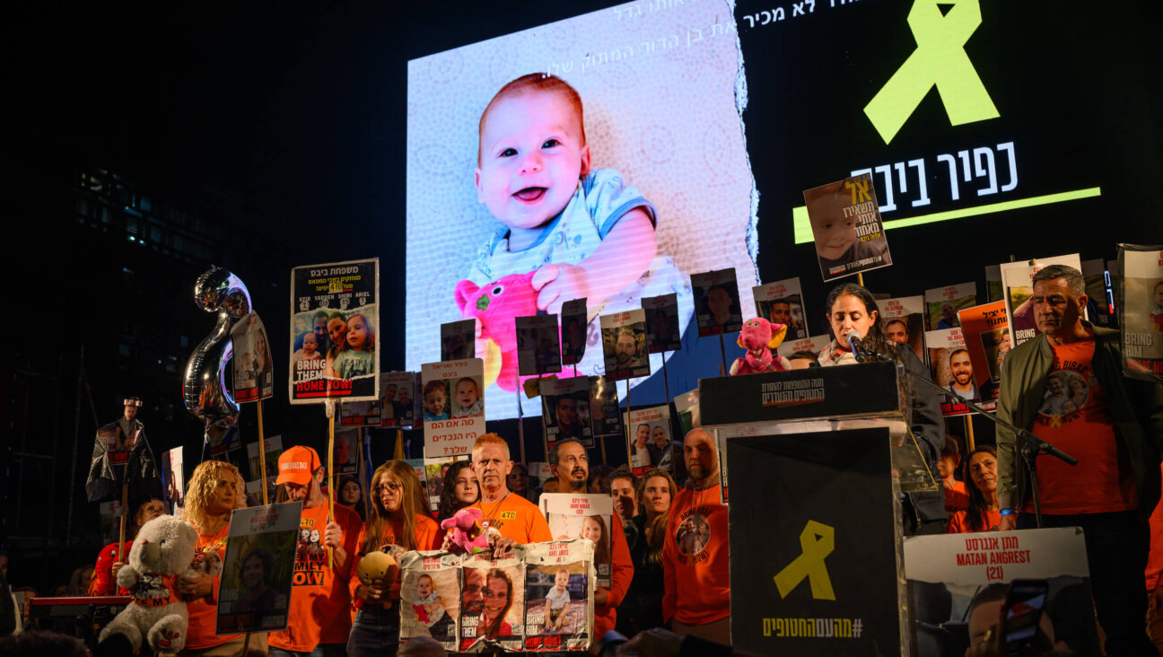 Ofri Bibas Levy, sister of hostage Yarden Bibas, speaks during a rally marking Kfir Bibas's second birthday at Tel Aviv's Hostages Square. 