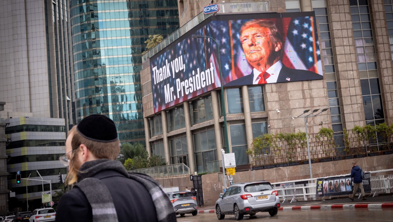 A large billboard posted by the Ayalon highway in Tel Aviv, in support of U.S. President Donald Trump, Feb. 5, 2025. (Miriam Alster/Flash90)