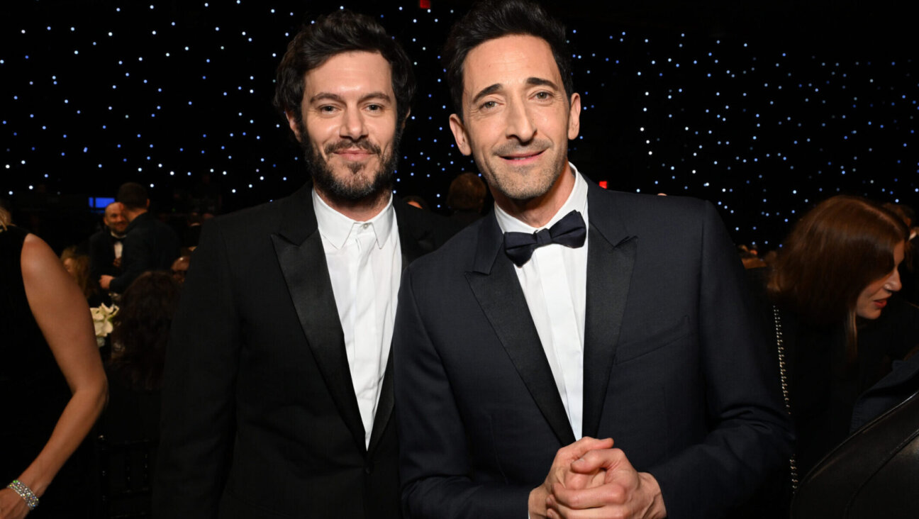 Adam Brody, left, poses with fellow actor Adrien Brody at the 30th Annual Critics Choice Awards in Santa Monica, California, Feb. 7, 2025. (Michael Kovac/Getty Images for Critics Choice Association)