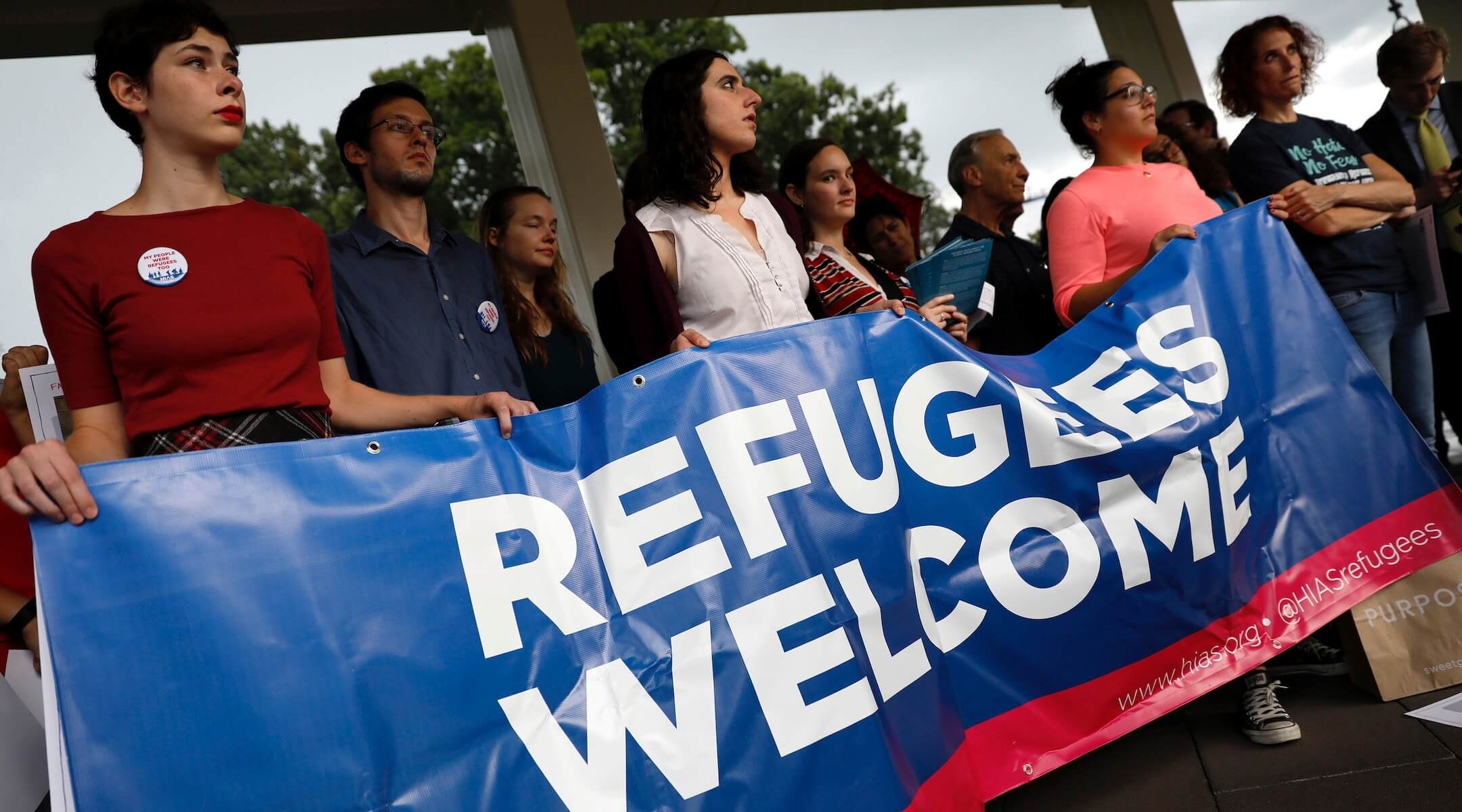 Activists hold a banner during a pro-refugee demonstration organized by HIAS outside the U.S. Capitol, Sept. 14, 2017. (Aaron P. Bernstein/Getty Images)