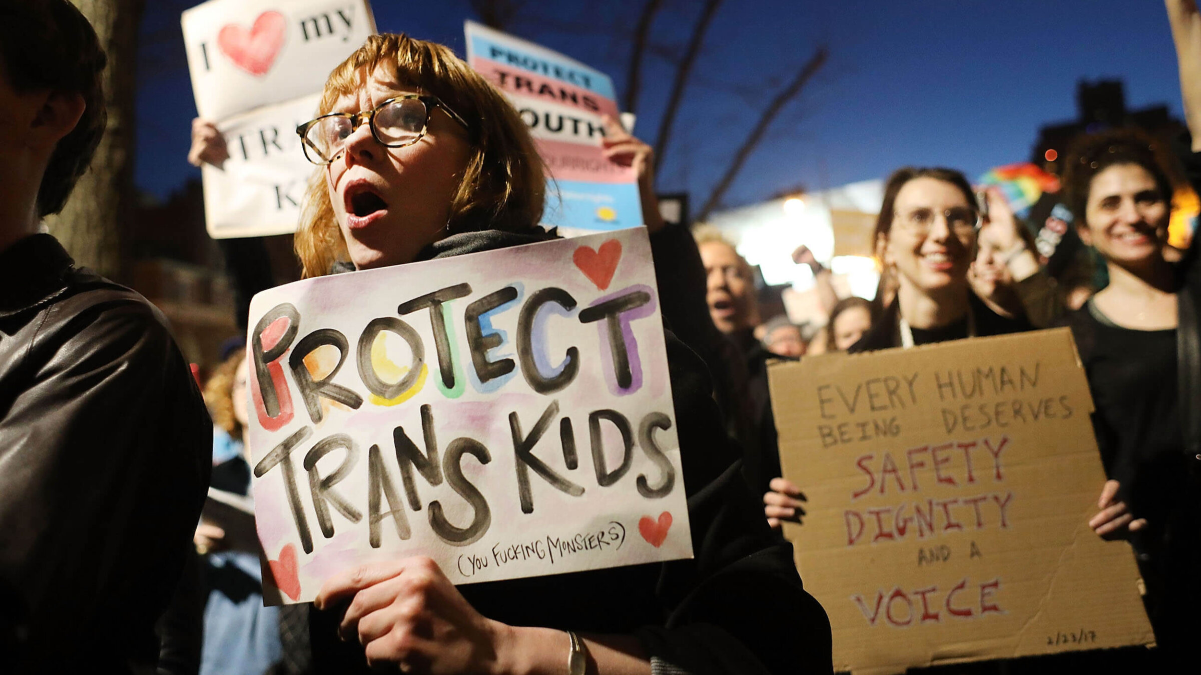 Demonstrators protest against President Donald Trump's approach to transgender issues during his first term, on Feb. 23, 2017.